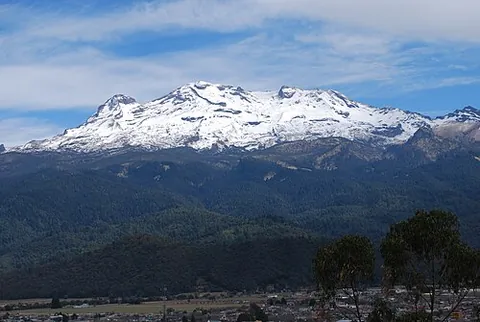 iztaccíhuatl: a mountain in central Mexico, the third-highest peak in Mexico