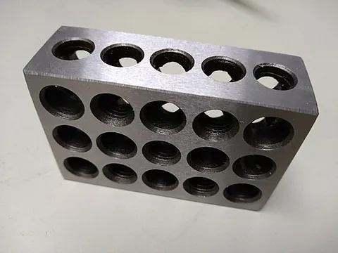 1-2-3 block: a tool used in machining fields, especially milling, to aid in setup. It is a block of steel that...