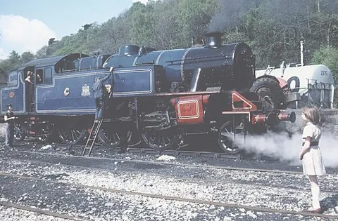 2-6-4: under the Whyte notation system, a steam locomotive that has two leading wheels, six coupled...