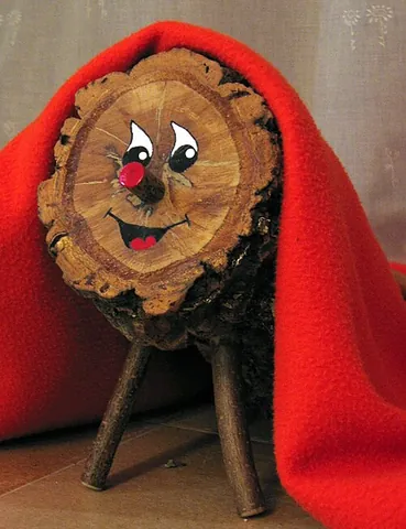 tió de nadal: a traditional Catalan Christmas character made by decorating a short log. It is “fed” with gifts...