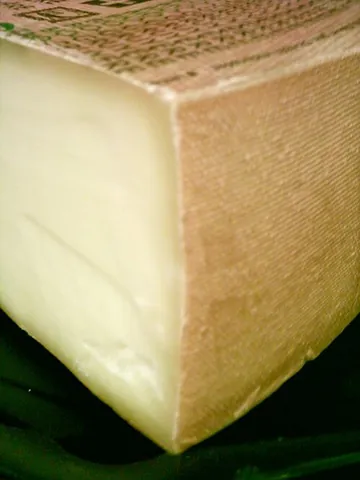 gruyère: a hard yellow cheese originating from Gruyères, Switzerland and made in the cantons of Fribourg