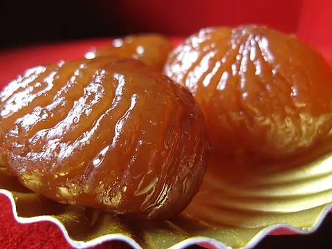 marron glacé: a chestnut preserved in sugar or syrup and flavoured with vanilla