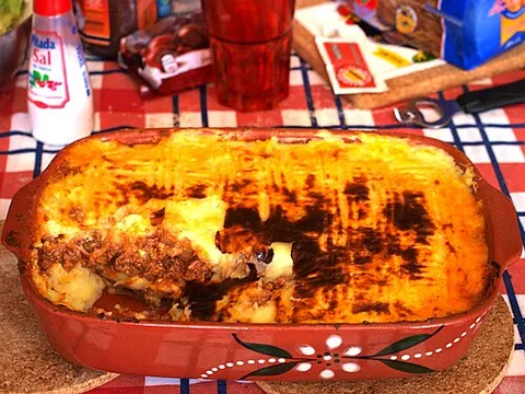 empadão: a traditional Portuguese dish, made in an oven, consisting of a layer of meat or seafood between...