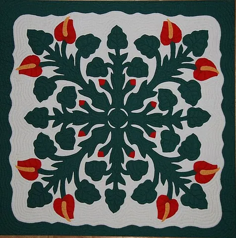 hawaiian appliqué: a style of appliqué characterized by large-scale designs with symmetry generated by folding the...