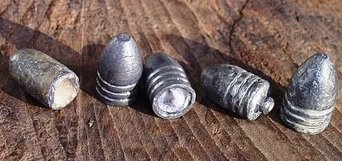 minié ball: a muzzle-loading bullet with a hollow base, much used in the second half of the nineteenth century