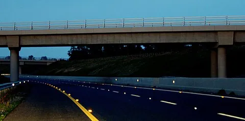 cat's eye: a retroreflective device placed on a road surface as a marking that can be seen even at night