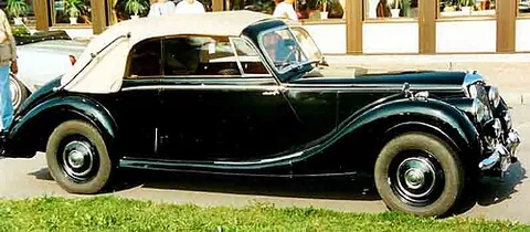 drophead coupé: a four-seated sports car with two doors, a folding roof and a sloping rear; a soft top