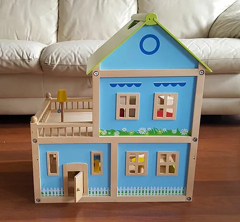 doll's house: a miniature house used by children as a toy for recreating domestic settings