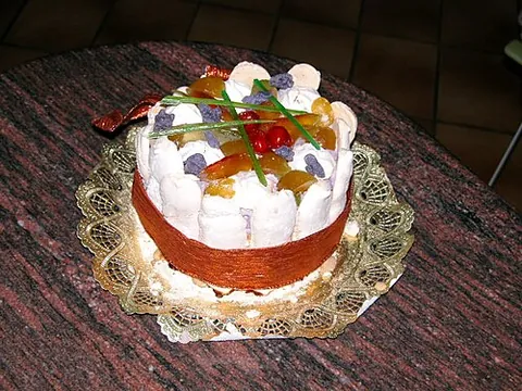 vacherin glacé: a cake-shaped dessert made of a meringue shell filled with ice cream and topped with whipped cream