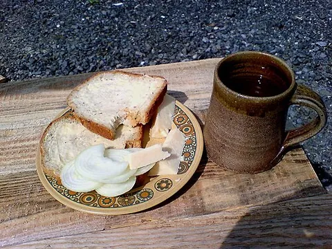 ploughman's lunch: a light meal of bread, cheese, and pickled onions (or cucumbers), etc., especially one served in a...