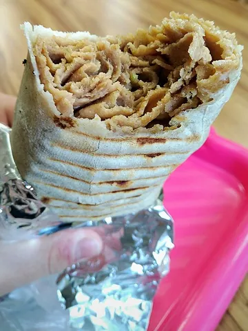 dürüm: a traditional Turkish wrap (which is made from lavash or yufka flatbread) that is filled with...