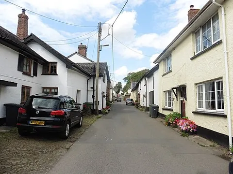 bishop's nympton: a village and civil parish in North Devon district, Devon, England (OS grid ref SS7523)