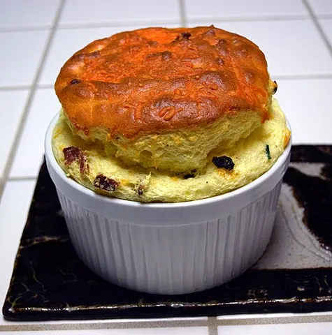 soufflé: a baked dish made from beaten egg whites and various other ingredients, usually prepared and served...