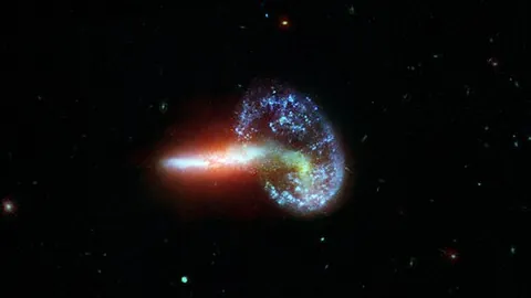 mayall's object: a colliding galaxy pair in the Ursa Major constellation with the peculiar shape like a ring with a...