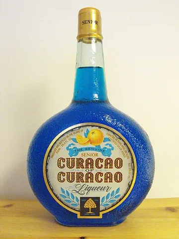 curaçao: a liqueur made from eau de vie, sugar, and dried peel of sweet and sour oranges, naturally...