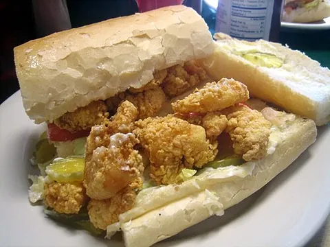 po' boy: a sandwich made on a French bread roll cut lengthwise and usually containing a meaty filling (for...