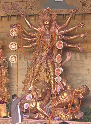 aarti: a particular Hindu prayer ritual, involving candles made from clarified butter