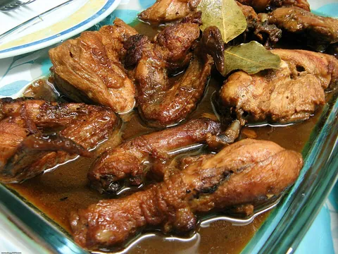 adobo: a Philippine dish in which pork or chicken is slowly cooked in a sauce including soy sauce,...