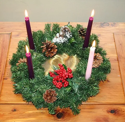 advent wreath: a usually evergreen wreath adorned with four (or sometimes five) candles, the first of which is lit...