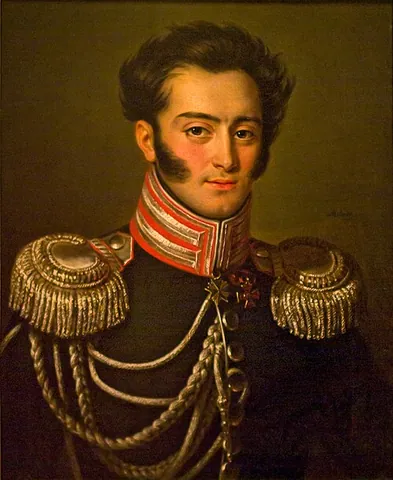 aiguillette: an ornamental braided cord with decorative metal tips worn on uniforms