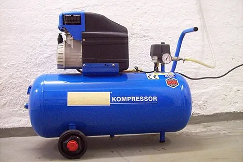 air compressor: a machine for generating compressed air, typically for use by air-powered tools or paint sprayers