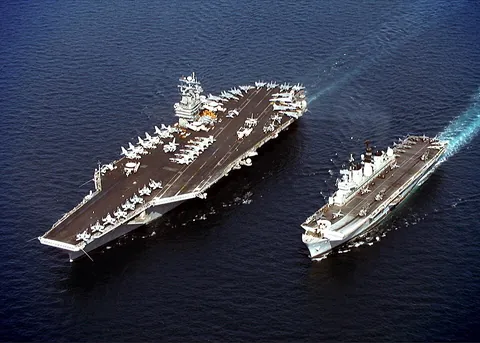 aircraft carrier: a warship designed to carry aircraft, serving as a seagoing air base, with a deck on which aircraft...