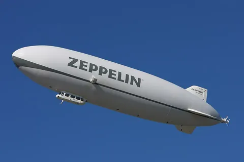 airship: a lighter-than-air aircraft that can be propelled forward through the air as well as steered