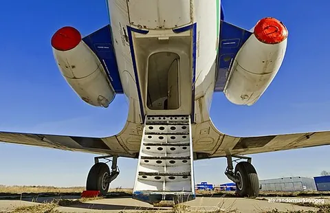 airstair: a set of stairs permitting entry to and exit from an aeroplane, typically built into a folding door