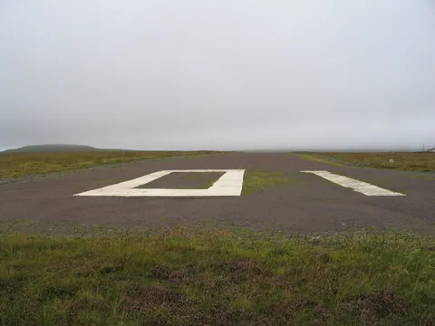 airstrip: an aircraft landing field, usually with one runway and only basic facilities