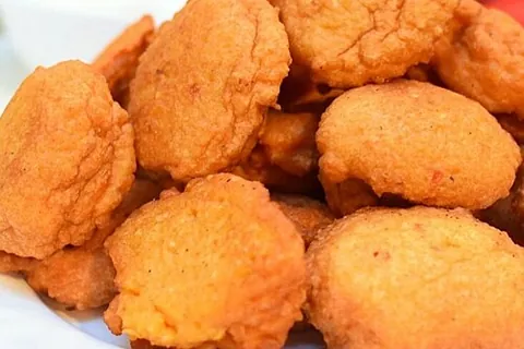 akara: a bean cake, made of fried black-eyed pea flour