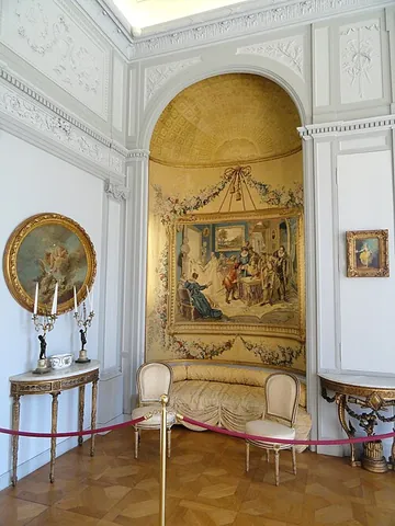 alcove: a small recessed area set off from a larger room