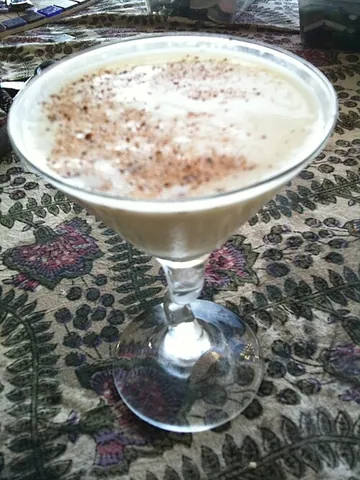 alexander: a cocktail made of cognac or gin, white crème de cacao, and light cream