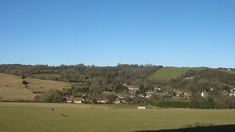 alkham: a village and civil parish in Dover district, Kent, England (OS grid ref TR2542)