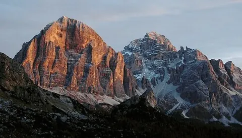 alpenglow: a rosy or reddish glow seen during sunset or sunrise on the summits of mountains, especially...