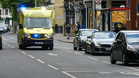 ambulance: an emergency vehicle designed for transporting seriously ill or injured people to a hospital