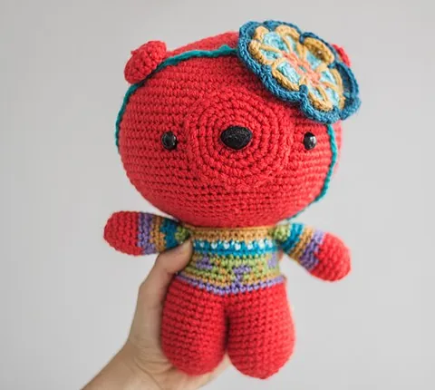 amigurumi: the Japanese art of crocheting or knitting stuffed yarn toys, typically creatures having oversized...
