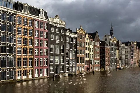 amsterdam: a city and municipality of North Holland, Netherlands; the capital city of the Netherlands