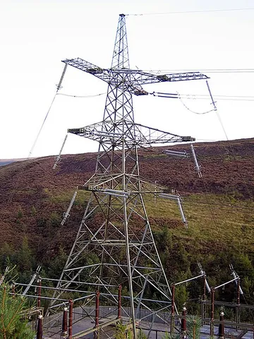 anchor pylon: a pylon that forms the endpoint of a high-power transmission line and uses horizontal insulators,...