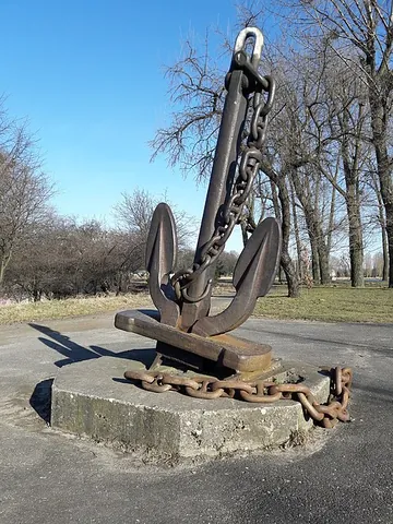 anchor: a tool used to moor a vessel to the bottom of a sea or river to resist movement