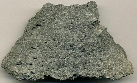 andesite: any of a class of fine-grained intermediate igneous rock, of volcanic origin, containing mostly...