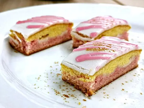 angel cake: a layer cake consisting of two or three layers of sweet sponge (made with butter) coloured white,...