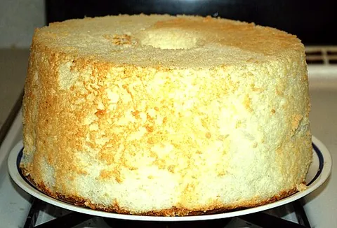 angel food cake: a type of light sponge cake which originated in the United States, made with whipped egg whites...