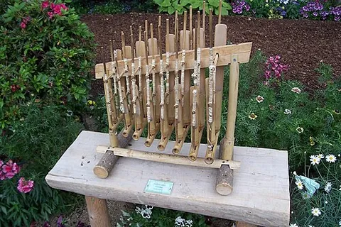 angklung: a percussion instrument, originally from Indonesia, made of two or more bamboo tubes attached to a...