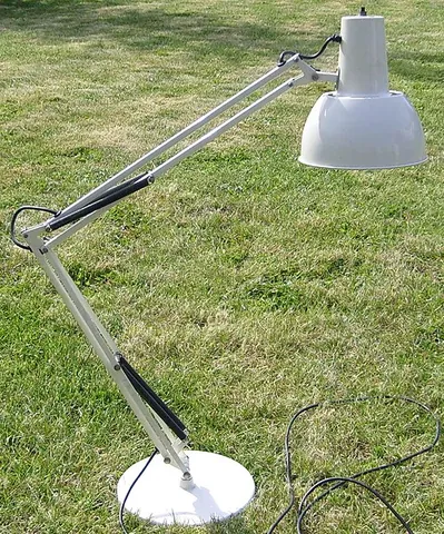 anglepoise: a lamp with an adjustable folding arm to allow the direction of light to be changed