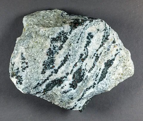 anorthosite: a phaneritic, intrusive igneous rock characterized by a predominance of plagioclase feldspar