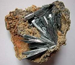 antimonite: a grey mineral, antimony sulfide (Sb₂S₃) that is the main source of antimony; stibnite
