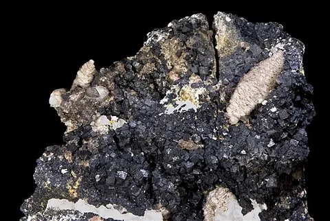 antozonite: a radioactive variety of fluorite, containing traces of elemental fluorine gas
