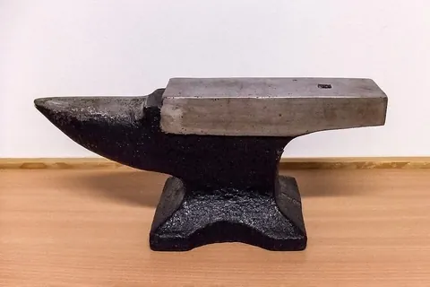 anvil: a heavy iron block used in the blacksmithing trade as a surface upon which metal can be struck and...