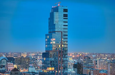 apartment tower: a tall apartment building or tower block