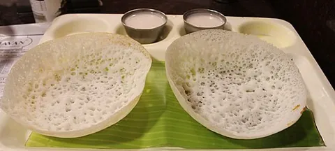 appam: a thin South Asian pancake made from rice flour and coconut